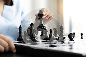 Business people are planning marketing strategies by analyzing the mechanisms and probability of the market by using chess to work