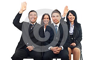 Business people raise hands