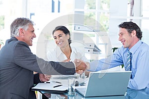 Business people reaching an agreement photo