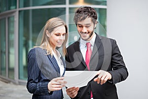 Business people reading a document