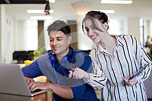 Business people In Relaxation Area Of Modern Office