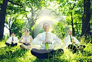 Business People Relaxation Meditating In The Woods Concept