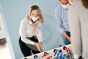 Business people relaxing in shared office space