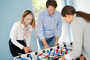 Business people relaxing in shared office space