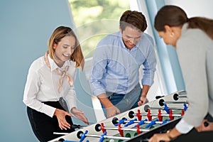 Business people relaxing in shared office space