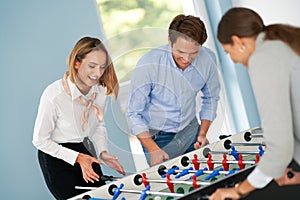 Business people relaxing in shared office space