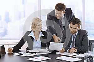 Business people reviewing documents