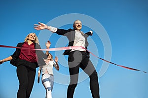 Business people running on racing track