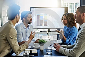 Business people, screen and discussion with team in meeting, presentation or conference at office. Group of employees