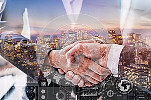 Business people shaking hand, Partnership Successful deal after meeting, Business cooperation concept with technology icon