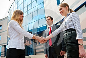 Business people shaking hands