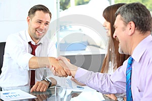 Business people shaking hands