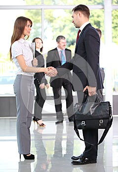 Business people shaking hands