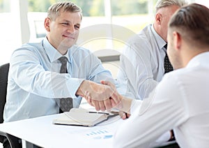 Business people shaking hands