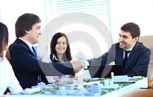 Business people shaking hands