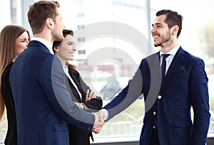 Business people shaking hands