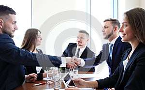 Business people shaking hands