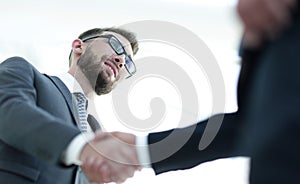 Businessmen making handshake - business etiquette, congratulatio