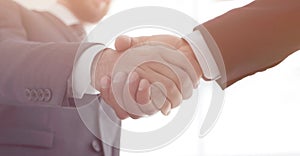 Businessmen making handshake - business etiquette, congratulatio