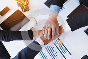 Business people shaking hands after finishing up a meeting good teamwork in office.Teamwork successful Meeting Workplace strategy