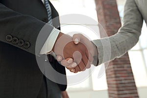 Business people shaking hands isolated on white background