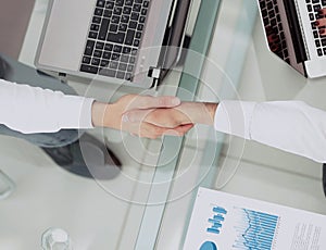 Business people shaking hands during a meeting