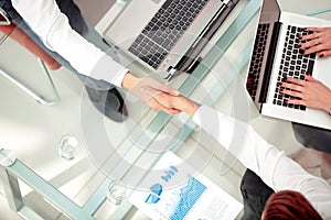 Business people shaking hands during a meeting