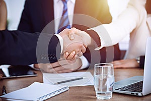 Business people shaking hands at meeting or negotiation in the office. Handshake concept. Partners are satisfied because