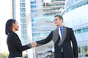 Business People Shaking Hands at Office