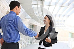 Business People Shaking Hands at Office