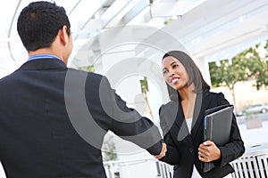 Business People Shaking Hands at Office