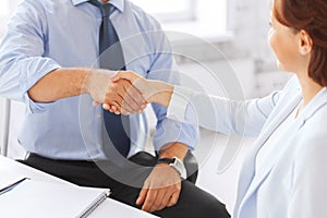 Business people shaking hands in office