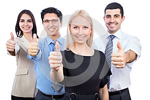 Business people showing thumbs up sign