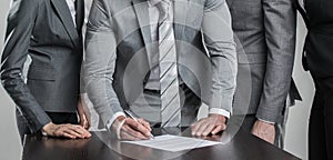 Business people sign contract