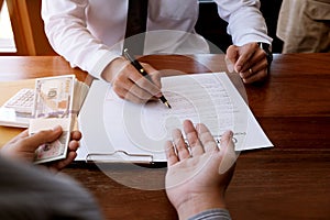 Business people signing contract making a deal with real estate agent Concept for consultant and home insurance concept