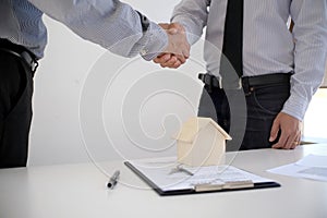 Business people signing contract making a deal with real estate agent Concept for consultant and home insurance concept