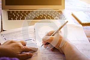 Business people signing documents,Business woman's hands writing on paper on desk