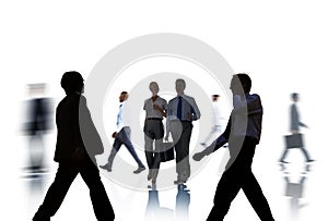 Business People Silhouettes Commuting and Isolated on White