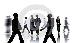 Business People Silhouettes Commuting and Isolated on White