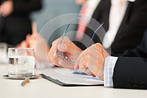 Business - people sitting in a meeting