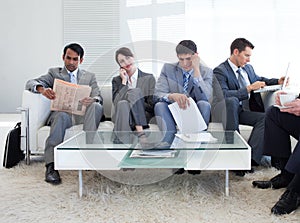 Business people sitting in a waiting room