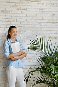 Business People. Smiling Woman Holding Laptop Computer. Freelance