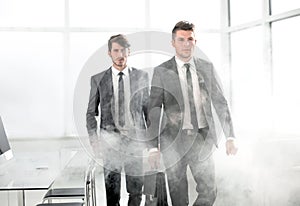 business people in a smoky office
