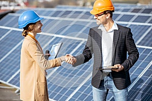 Business people on a solar power station