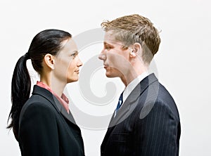 Business people standing face to face