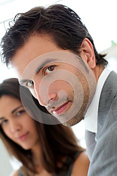 Business people standing in the hallway