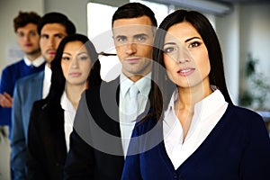 Business people standing lined up