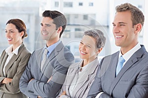 Business people standing in a row