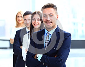 Business people standing together in line in a modern office