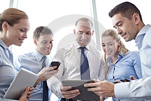 Business people with tablet pc and smartphones